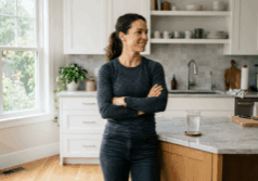 healthy person standing confidently in a kitchen